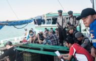 Indonesian officials want to stash 10,000 refugees on a desert island