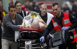 Charlie Hebdo: Gun attack on French magazine kills 12