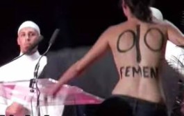 Topless feminists take over Islamist hardline conference on wife-beating in France